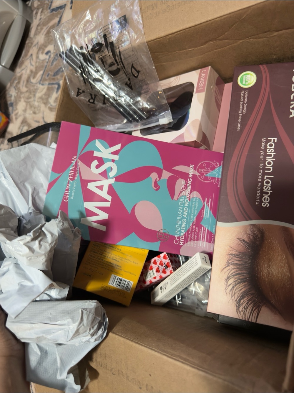 Box of 55 assorted face pieces